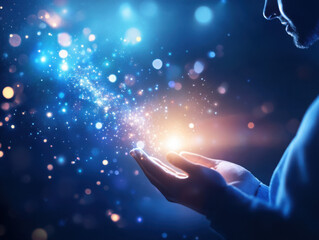 A person holding glowing particles symbolizing creativity and wonder.