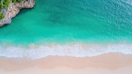 Aerial view of stunning turquoise beach with soft white sand