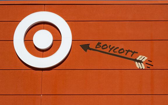 An arrow with the word boycott heading towards a white Target bullseye.