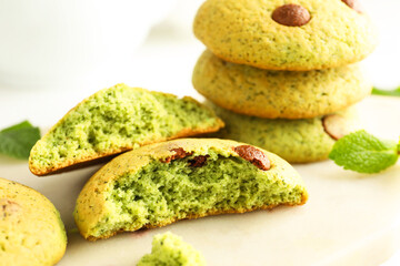Delicious mint chocolate chip cookies on white table, closeup