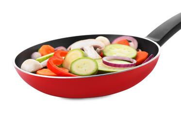Frying pan with mix of fresh vegetables and mushrooms isolated on white
