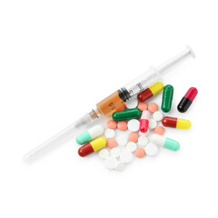 Drug addiction. Different pills and syringe isolated on white, top view