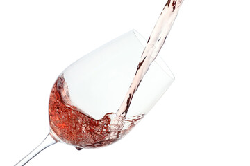 Pouring rose wine into glass on white background