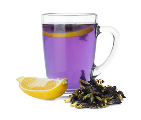 Delicious butterfly pea flower tea in glass mug, lemon and dry petals isolated on white