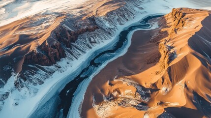 Naklejka premium Aerial view Frozen river carving desert canyon