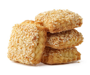Crispy sesame seed cookies stacked together on a plain background for a delightful snack experience