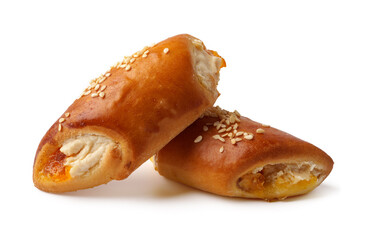 Freshly baked savory rolls filled with cheese and sweet toppings on a white background