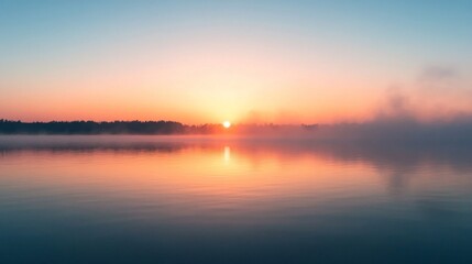 Obraz premium Misty Sunrise Over Calm Lake Water Reflection