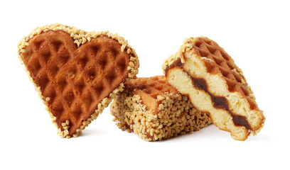 Heart-shaped and rectangular waffle snacks with nutty coating and caramel filling in a bright setting