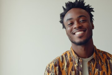 Fototapeta premium African black men, 20-40 years old, dressed in simple, work appropriate attire, relaxed in front of solid backgrounds, capturing their authentic style and confidence.