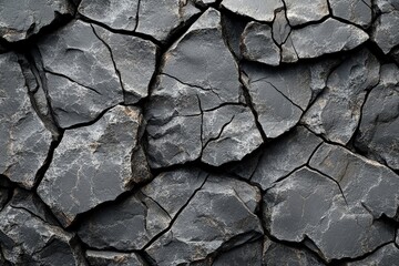 Fototapeta premium Close up of a cracked surface showing texture and detail in natural light