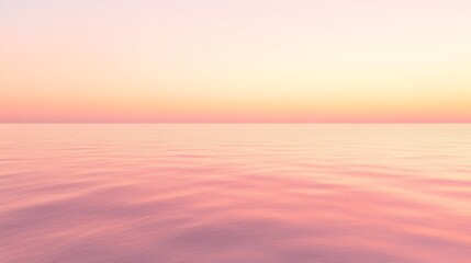 Obraz premium A soothing gradient of light pink and peach with a smooth, pastel texture