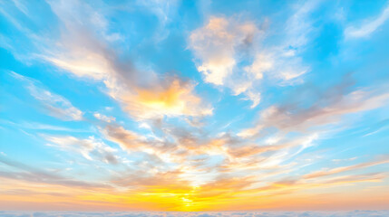 Fototapeta premium Vibrant sunset sky over cloudscape. Background ideal for design