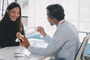 Doctor gives patient prescription medication