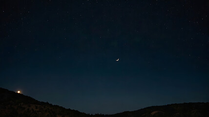Fototapeta premium dark night with small moon & star lighting in sky
