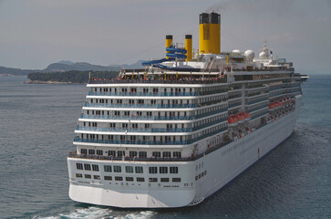 Modern cruiseship cruise ship liner Mediterranean sail away departure from Dubrovnik, Croatia with...