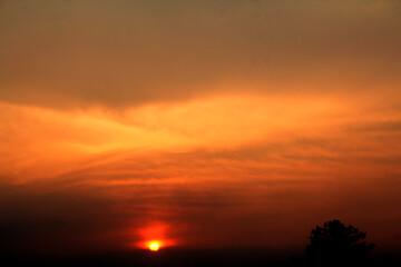 A suburban sunset in summer, bright and warm to enjoy.