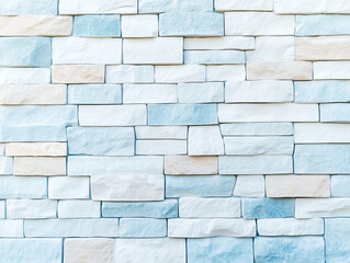 Obraz premium blue neon light on a brick wall at night