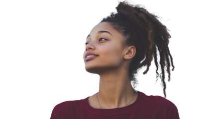 Young woman with curly hair looking thoughtfully to the side in casual attire against a light background