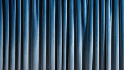 Luxurious deep blue velvet curtains create a soothing abstract backdrop with rich textures and elegant folds, enhancing sophistication and calmness.