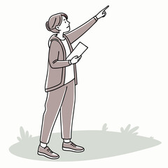 Person pointing at something in a garden
