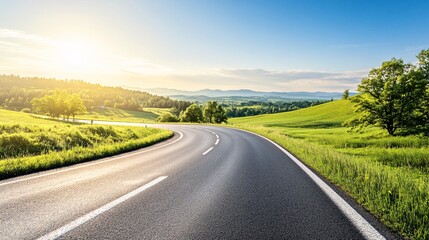Fototapeta premium Serene Curved Road Through Lush Green Countryside Landscape