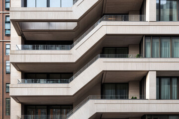 Modern architectural design with unique balconies in urban setting