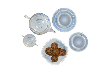 classic tea ceramic tea set with blue texture and cookies - white background