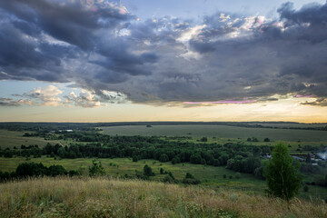 cloudy landscape at sunset in the countryside