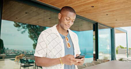 Black man, smile and outdoor with mobile for social media, travel planning and contact at hotel....