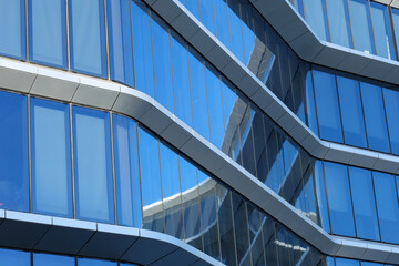 modern glass building with geometric architectural design