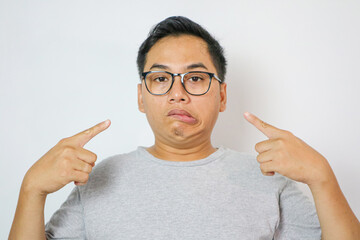 close-up of the mouth of a young men with hemiparesis, Bell's palsy. Forced smile across half face. Muscles paralyzed by inflammation of the facial nerve