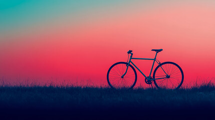 Naklejka premium Sunset Ride: Bicycle Silhouetted Against Vibrant Sky