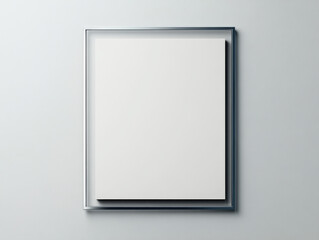 Blank canvas in a minimalist frame against a light gray wall. Perfect for your designs and artwork.