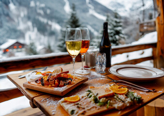snack on an alpine restaurant in the mountains , winter and skiing