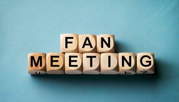 ファンミーティングを意味する英単語fan meetingの文字が書かれた木製のキューブブロック。 aiで生成	
