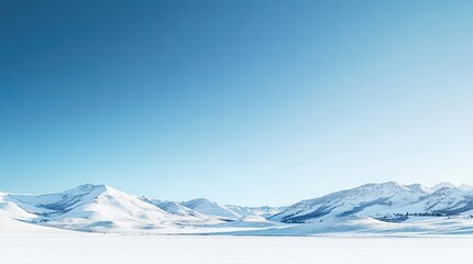 Fototapeta premium Snowy Mountain Landscape Under Clear Blue Sky