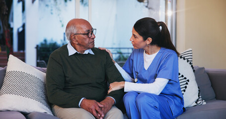 Senior, man and nurse with conversation on sofa for healthcare support, medical advice and...