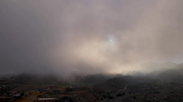 Soft fog over Cedros Island&rsquo;s hills during sunrise, creating a tranquil and atmospheric landscape, aerial overview