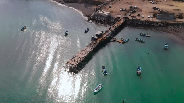 Aerial shot of Cedros Island pier and docked fishing boats under early morning light