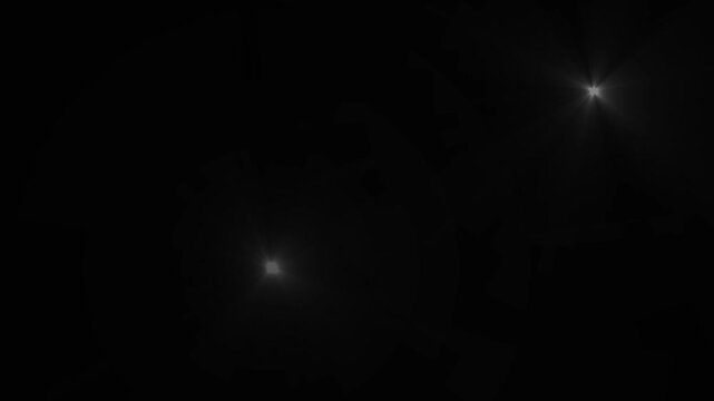 Photographer camera flashes. Random bright blinking lights. Flashing lens flare. Camera flashes of photographers on a black background. Photo camera flashes on the stadium, seamless loop.