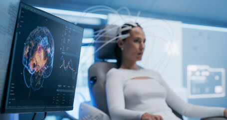 Futuristic Lab Uses Advanced Neural Technology to Scan Female Patient's Brain. Monitor and Display Show Illuminated Neural Pathways, Innovation in Cognitive Research and Diagnostics