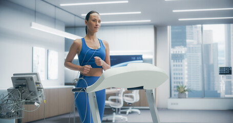 Female Athlete Wearing Headset for Cardiopulmonary Exercise Test on Treadmill in High-tech Medical...
