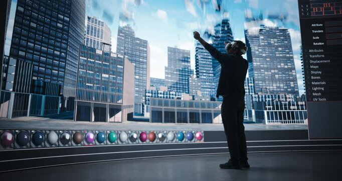Young Male Architect Explores the Possibilities of Parametric Design, Wearing a Virtual Reality Headset and Interacting with a Digital City. LED Wall Shows the Creative Evolving Design Process
