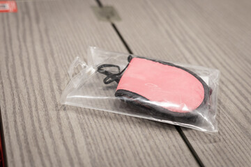 Packed travel blinds for the eyes on a train table. People using blinds for eyes for comfortable travel on a train