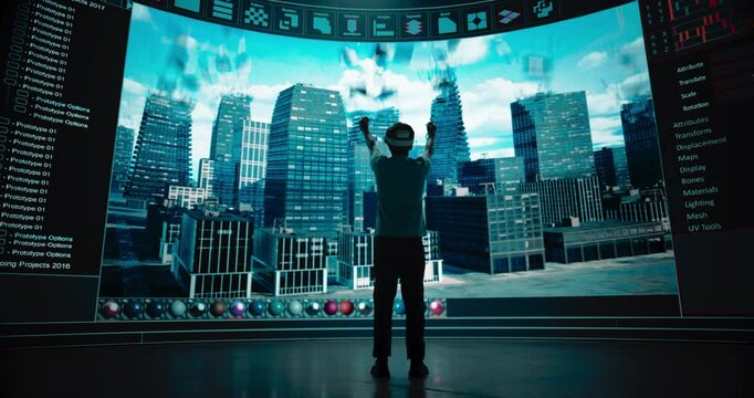 Young Urban Planner, Wearing a VR Headset, Shapes a Futuristic Urban Development. Big Digital Panorama Screen Visualizes the Dynamic Cityscape, Responding in Real-Time to the Engineer's Design Choice
