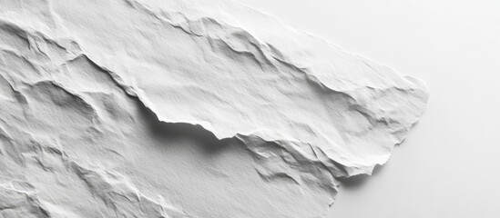 Obraz premium White textured paper background with subtle creases and rough edges, positioned diagonally to enhance design versatility and visual appeal.
