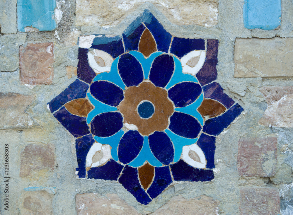 Wall mural Uzbek ceramic porcelain mosaic with flowers on wall of madrasa in Uzbekistan, Asia