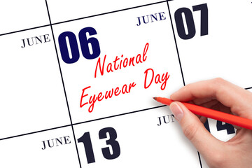 June 6. Hand writing text National Eyewear Day on calendar date. Save the date.