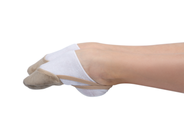 Legs of a gymnast in toe-shoe isolated on white.